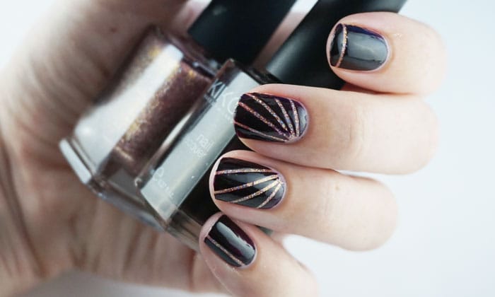 Nails with nail art using striping tape and holo nail polish