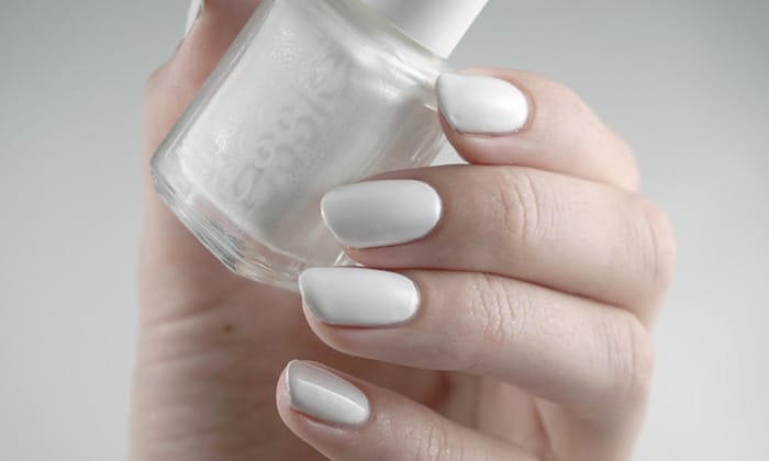 Swatches of Essie private weekend, a white creme nail polish
